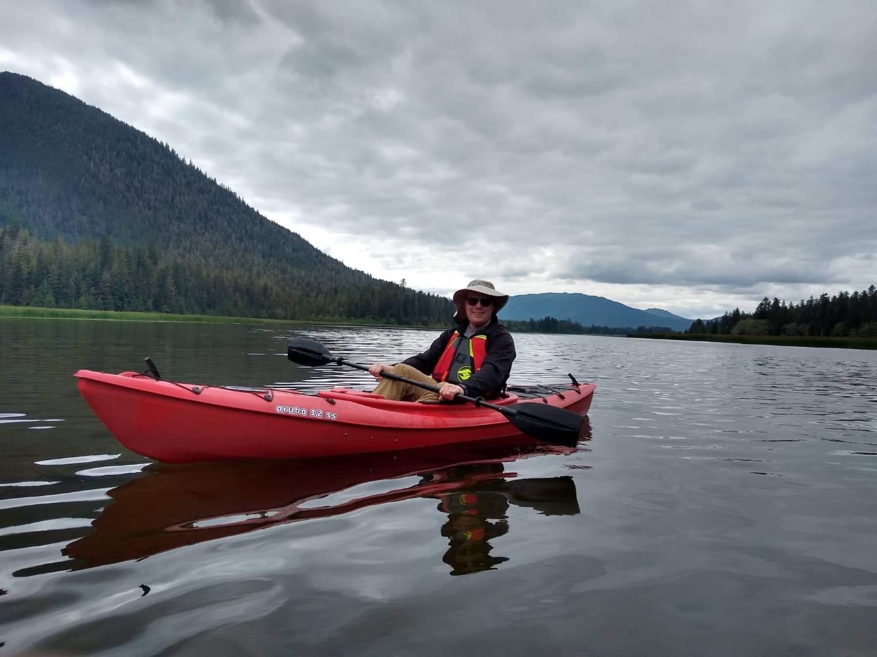 Picture of me on a lake in a kayak